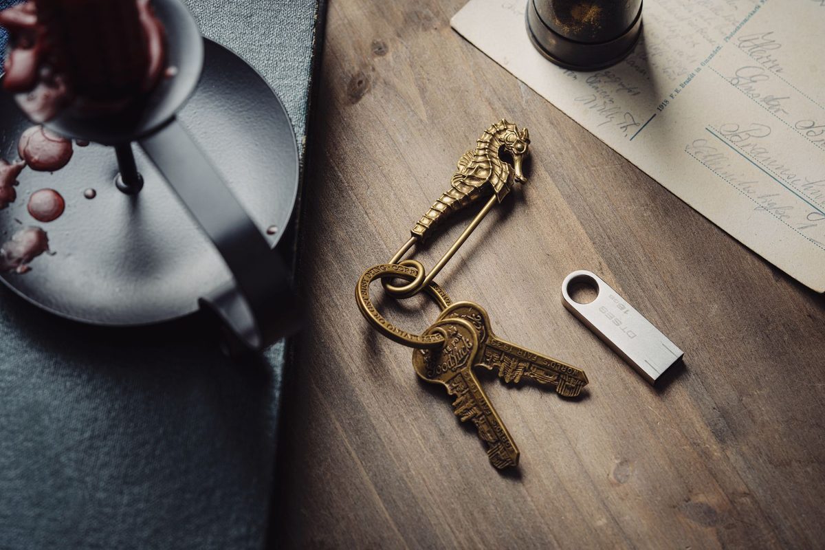 Brass keys on a wood table